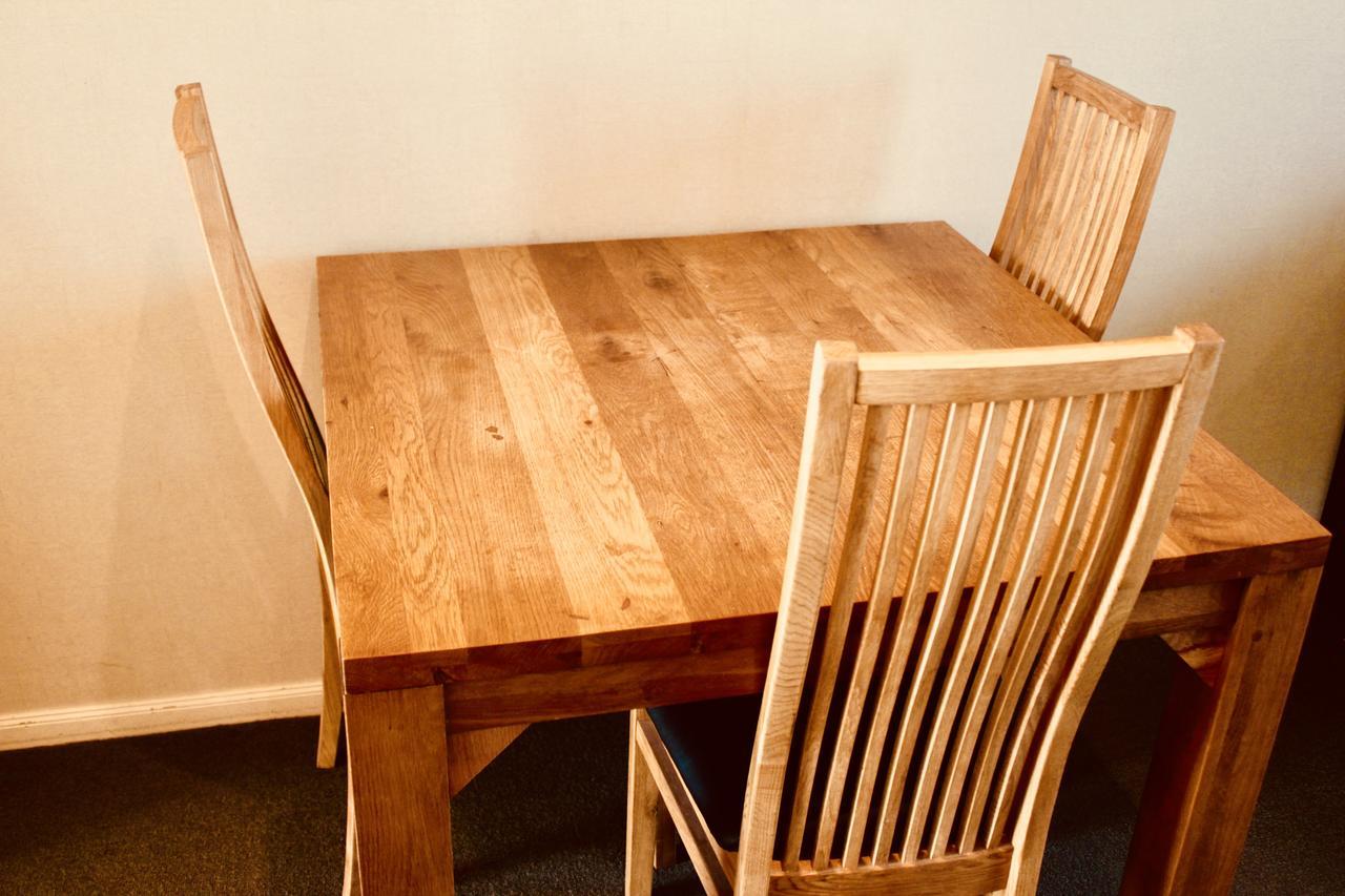 The Nautilus Ξενοδοχείο Napier Εξωτερικό φωτογραφία A dining table and chairs